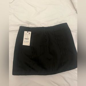 Black mini skirt